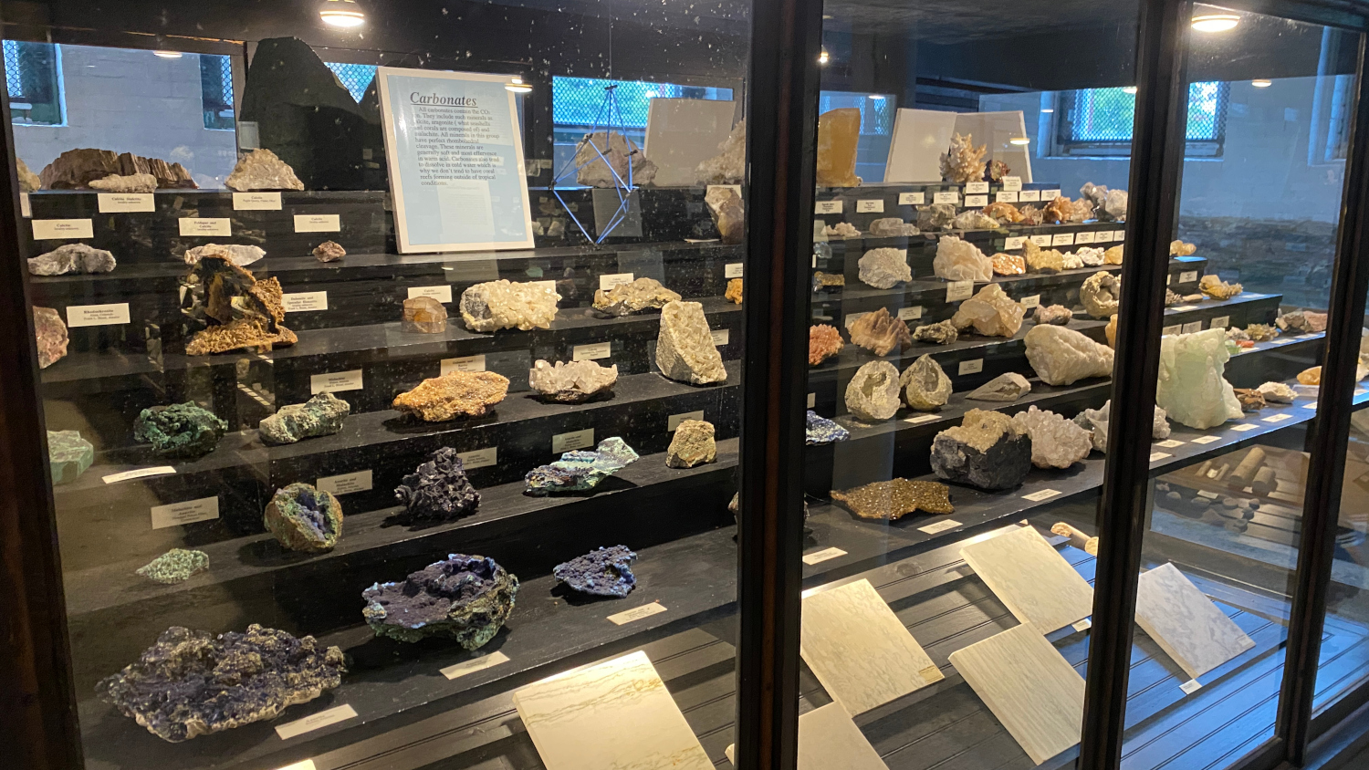 Museums in Maine Display Gem display in glass case at museums in Maine.