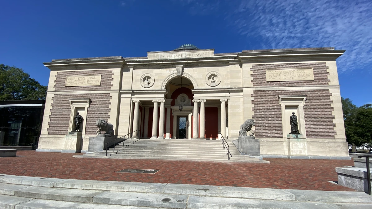Statues and historic building at free art museum.