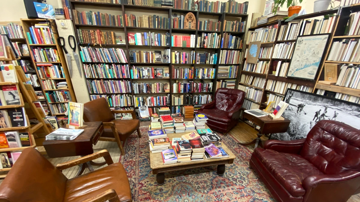 Maine bookstore local maine bookstore with books on shelves above 4 chairs